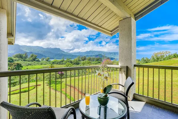 Sip morning coffee while enjoying peaceful mountain views from balcony