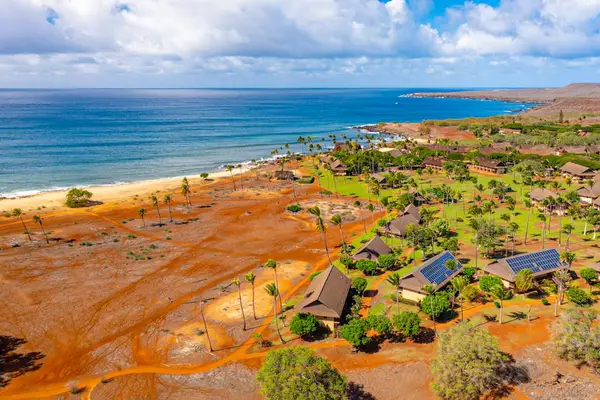 Coastal landscape offers broad island views beyond the resort grounds
