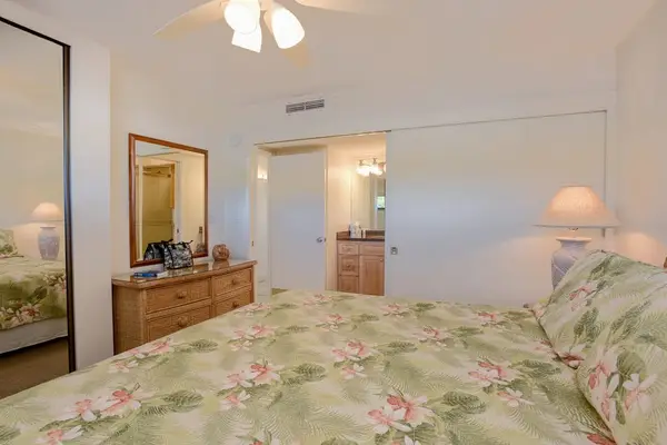 Comfortable Primary Bedroom With Island Style