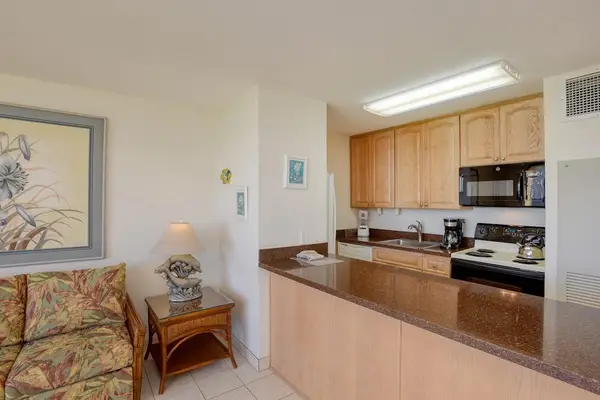 Well Equipped Kitchen With Breakfast Bar