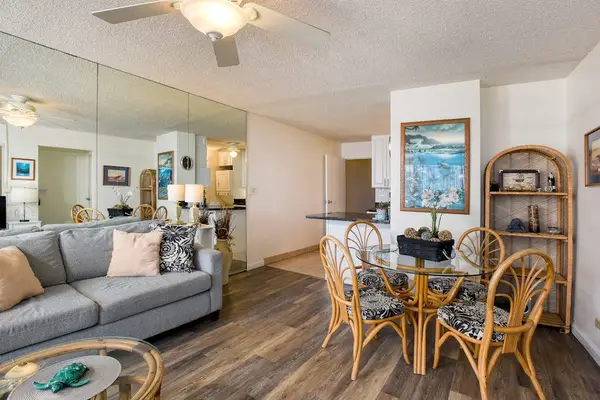 Dining room with seating for four, enjoy a great family dinner from the comfort of your condo.
