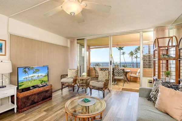 Lovely living room with comfortable seating, flat screen tv and lanai access.