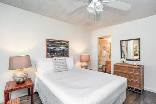 Guest bedroom with queen bed and ensuite bathroom.