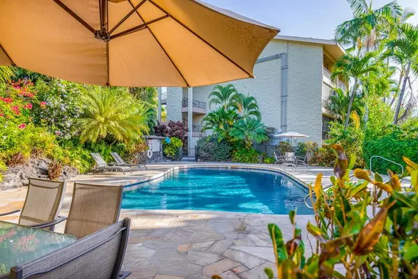 Poolside Patio Deck with Large Sun Umbrella & Lounging Area