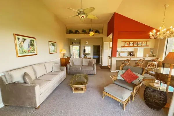 Vaulted Living Room Space with Plush Sofa Seating & Breakfast Bar