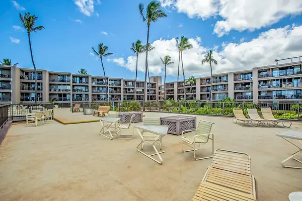Sunny Pool Deck Made For Relaxation