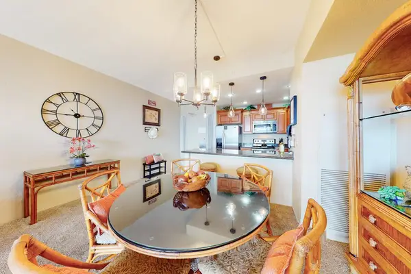 Charming dining nook with a view into the kitchen.