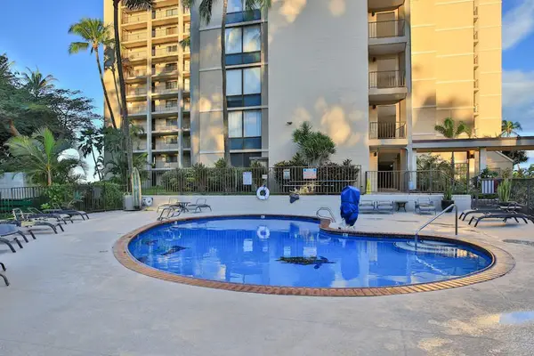 Refreshing Resort Pool With Island Vibes