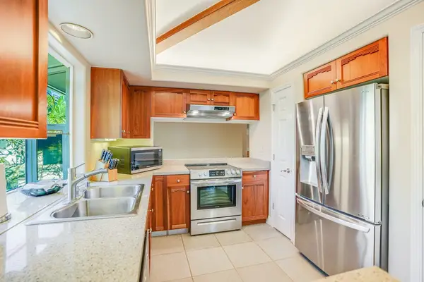Fully remodeled upgraded stainless steel kitchen.