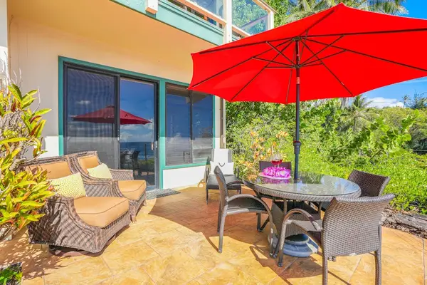 Covered lanai with table for morning coffee