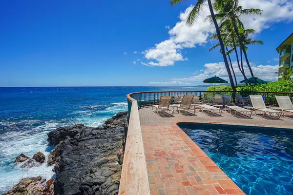 Spend sunny afternoons beside the sparkling pool