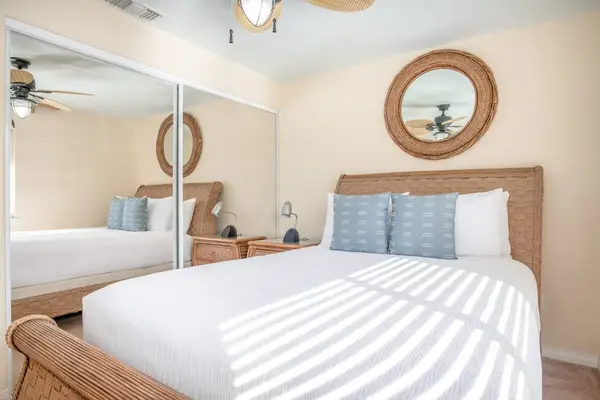 Primary Queen Bed with Crisp Linens & Mirrored Closet Doors