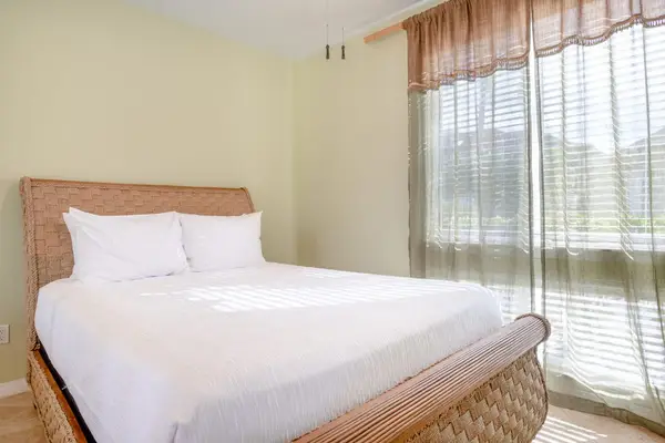 Comfortable Queen Guest Suite with Floor-to-Ceiling Windows & Sheer Curtains