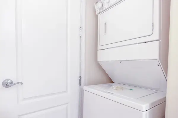 In-Unit Stacked Washer & Dryer for Guest Convenience