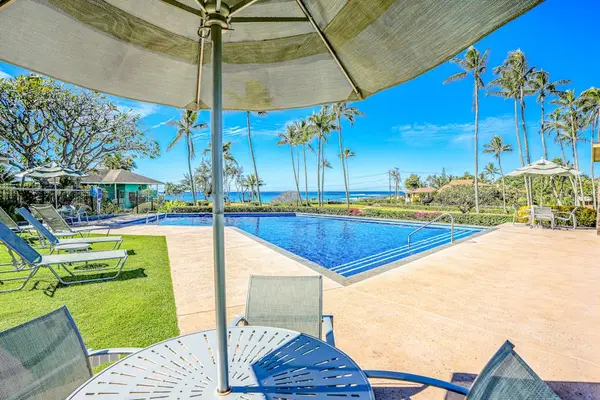 Resort pool with lounge chairs for sunny afternoons