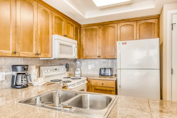 Bright Kitchen Ready For Island Feasts