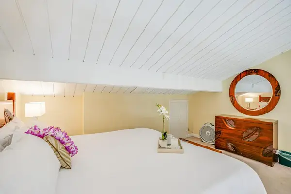 Recharge each night in this cozy and peaceful loft bedroom