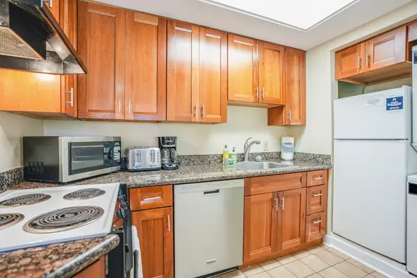 Cook delicious meals in this warm and functional kitchen space