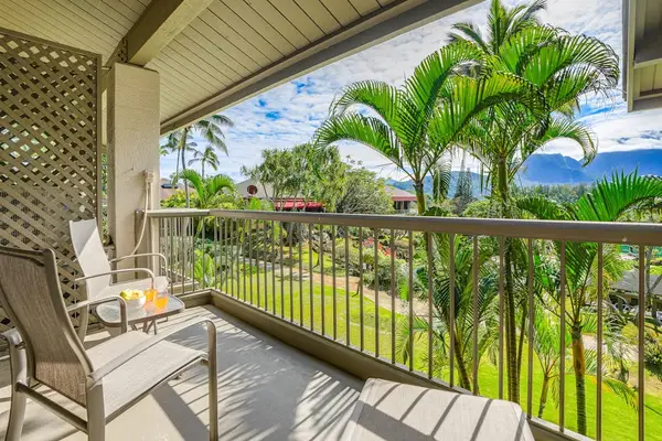 Step onto the balcony and enjoy peaceful lush tropical surroundings