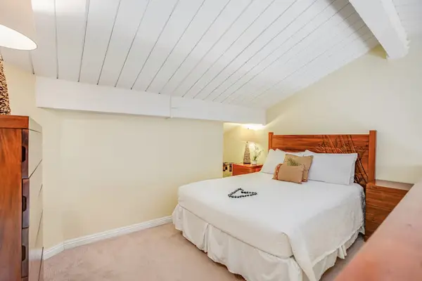 Settle into this peaceful bedroom designed for relaxing vacation nights