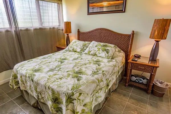 Comfortable queen bedroom with fresh linens for restful nights and peaceful mornings