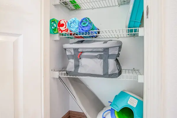 Convenient Laundry Closet With Essentials
