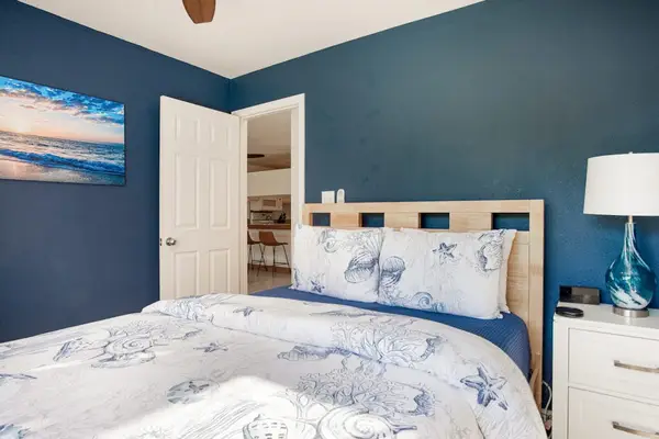 Stylish Guest Bedroom With Blue Accents