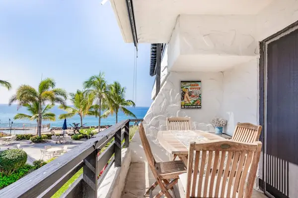 Covered Ocean View Lanai with Teak Dining Seating & Tropical Views