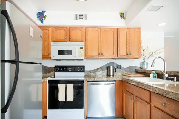 Full Kitchen View featuring Range Stove, Oven, Dishwasher & Refrigerator