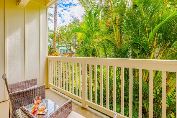 Peaceful Balcony Surrounded By Palms