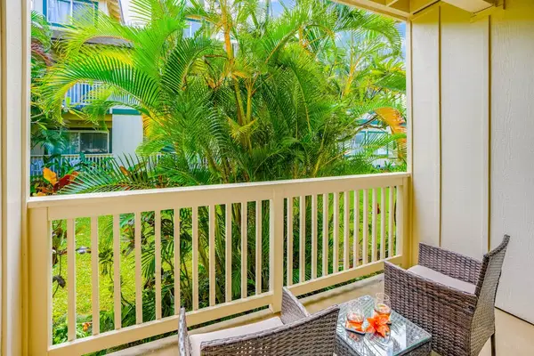 Private Balcony Surrounded By Tropical Greenery