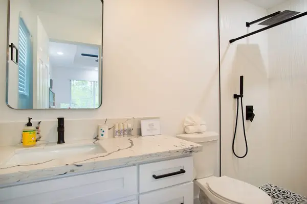 Guest bathroom with walk-in shower.