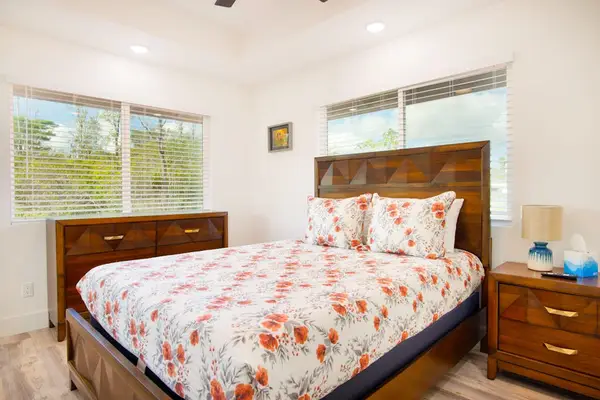 Master bedroom with queen bed and flat screen tv.