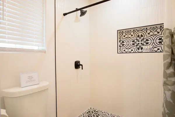 Guest bathroom with walk-in shower.
