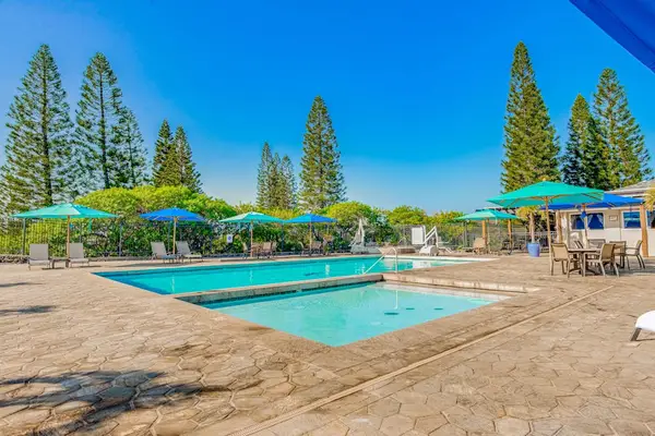 Sunny Pool Deck Perfect For Relaxation