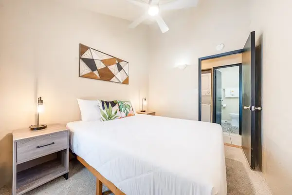 Primary bedroom with coastal-inspired decor