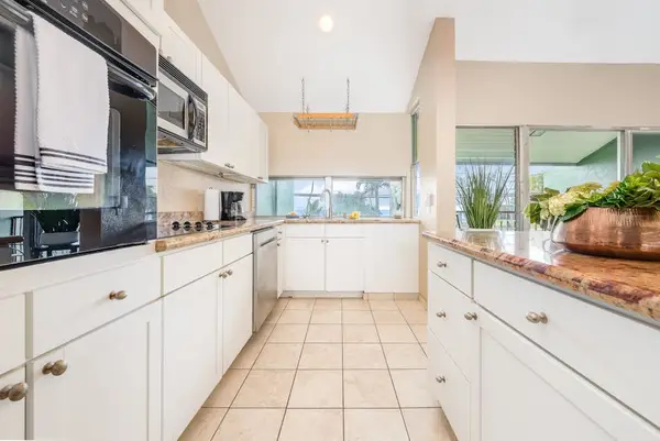 Sunlit kitchen with wood detailing