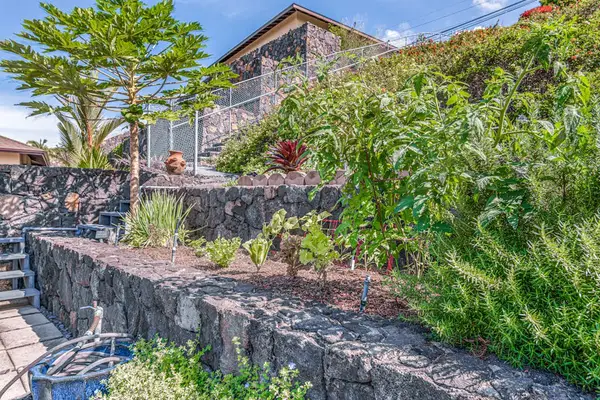 Private Backyard Surrounded By Lava Rock