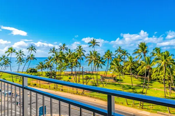 Unobstructed ocean and palm tree views from your private lanai