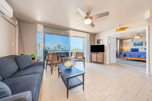 Sunlit living room with comfortable seating and ocean breeze