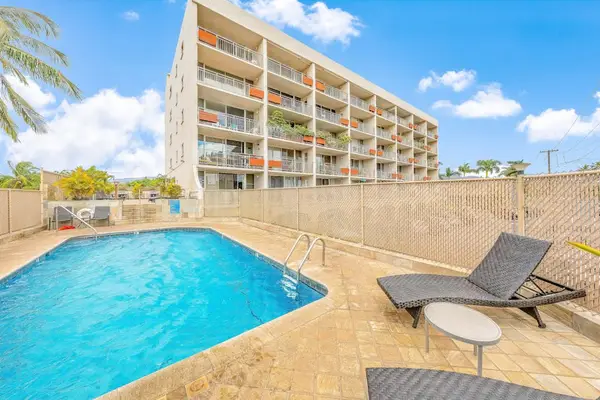 Refreshing outdoor pool and sun loungers for guest relaxation