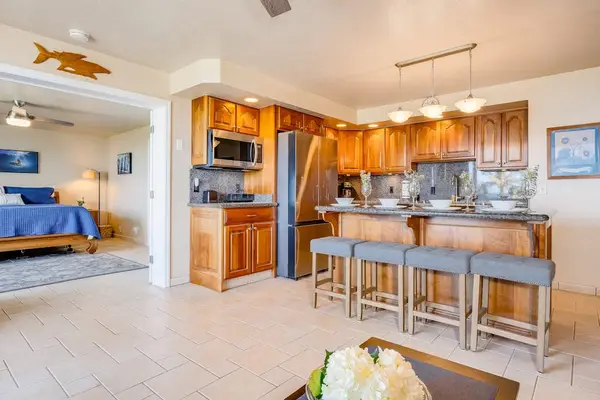 Fully remodeled kitchen with large island and barstool seating perfect for extra company or your sous chef.