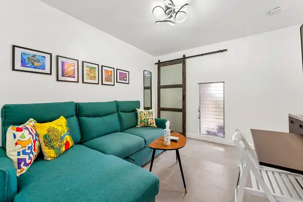 Enjoy movie nights from the comfortable sofa seating