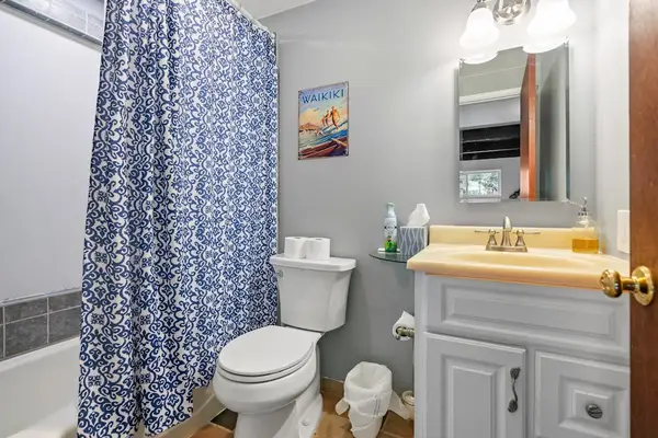 Full bathroom with clean, functional fixtures
