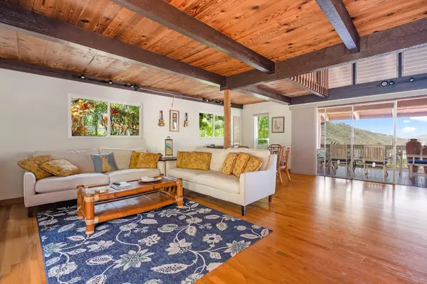 Spacious living room with island inspired decor