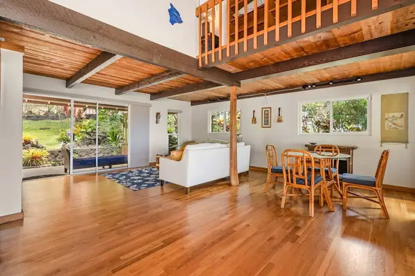 Bright dining room with vaulted ceiling