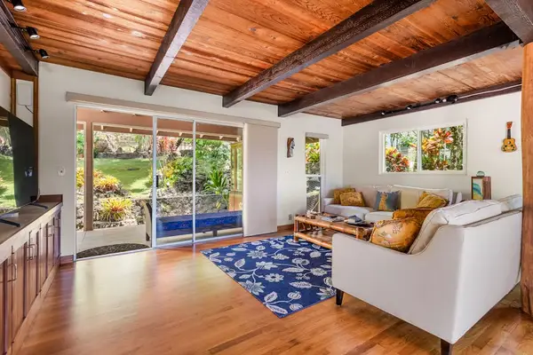 Great room with island style furnishings and space
