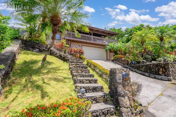 Exterior stairway leading through landscaped grounds