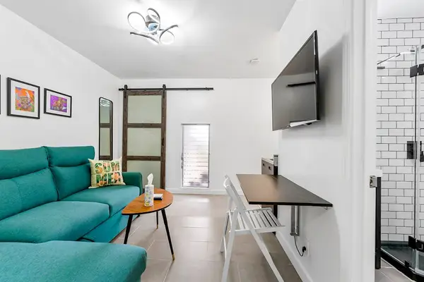 Bright studio room with flexible furniture layout