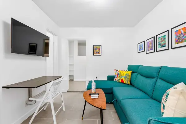 Studio Room with a sofa bed and television for movie nights